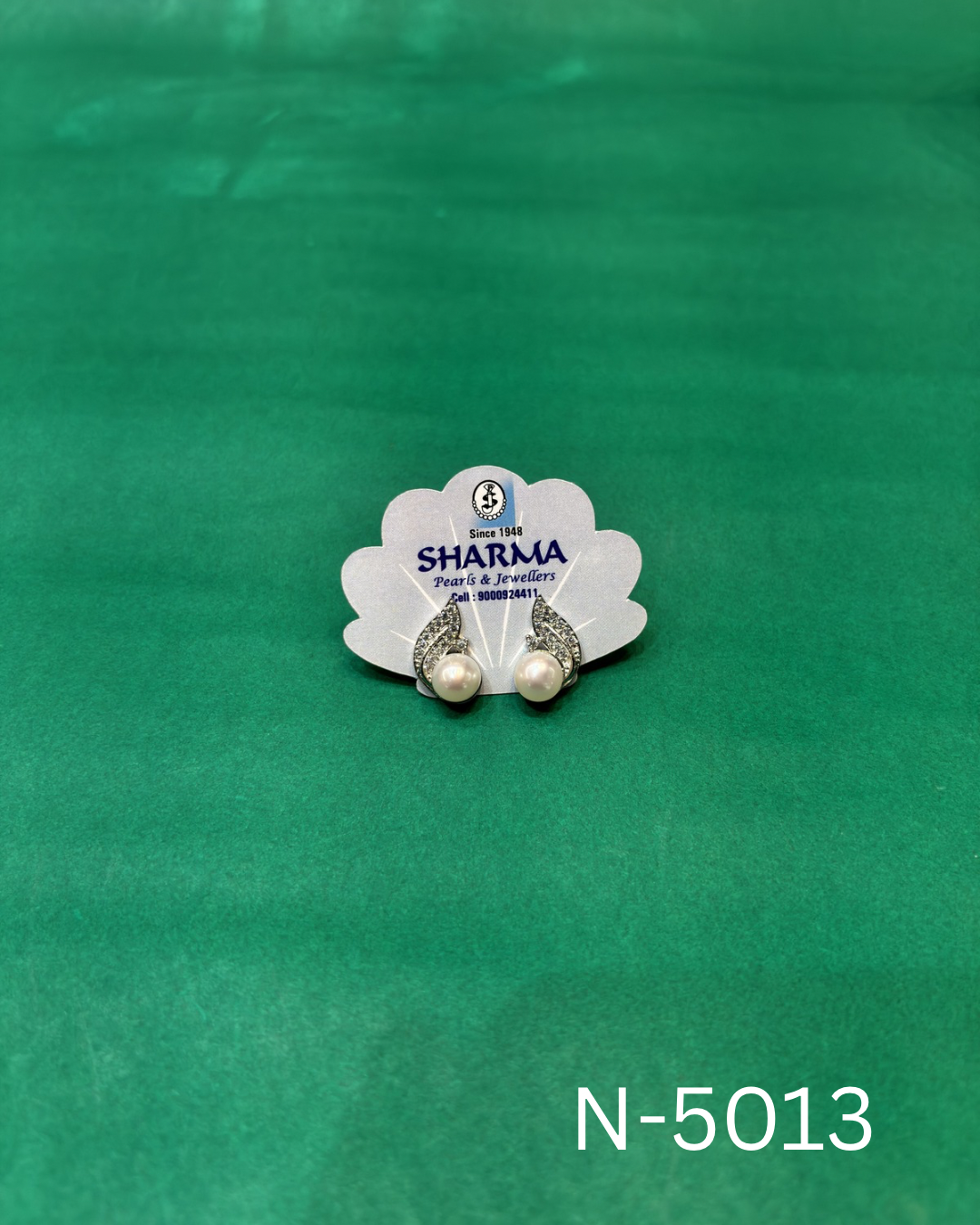 Elegant Pearl Leaf Stud Earrings – Silver Finish