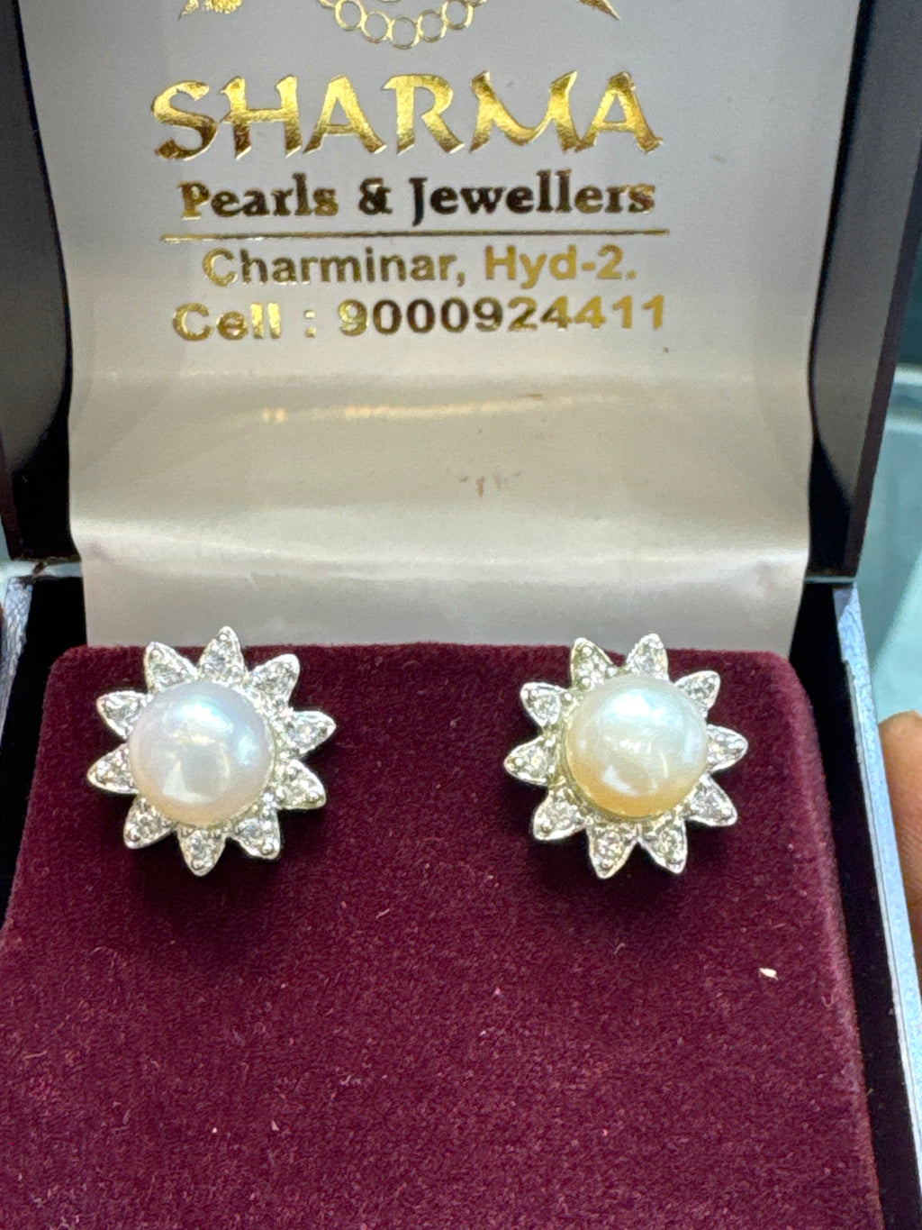 Floral white pearl studs