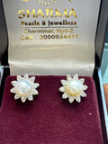 Floral white pearl studs