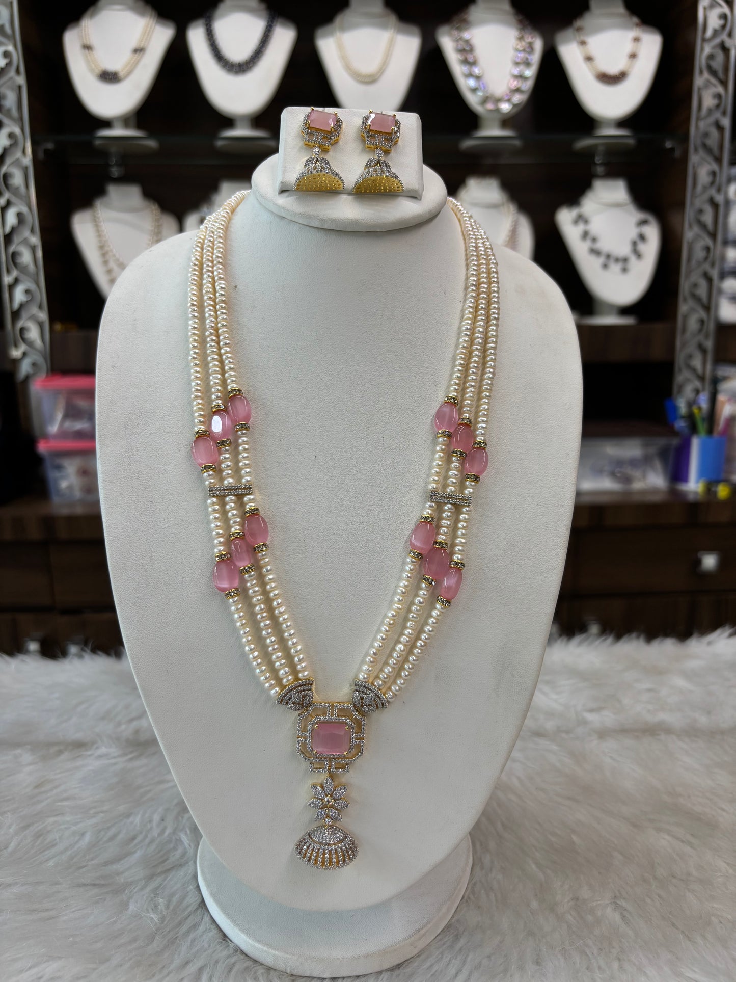 Elegant Triple Layer Pearl Necklace Set with Pink Stone Pendant & Earrings