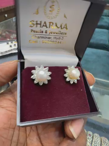 Floral white pearl studs